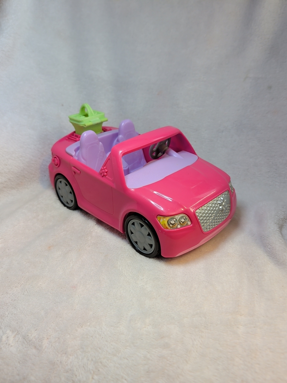 Fisher-Price Loving Family Pink Convertible Toy Car with Green Basket